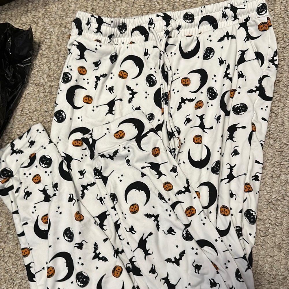 Halloween pj pants.size medium, colors white black orange brand better together